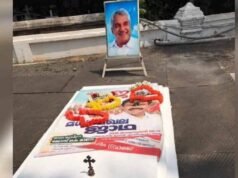 ഉമ്മന്ചാണ്ടിയുടെ കല്ലറക്ക് മുകളില് എല്ഡിഎഫ് ജാഥയുടെ പോസ്റ്റര്; വിവാദം പുകയുന്നു