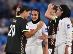 As manager inspires, Matthew swaps uniforms with Iran.