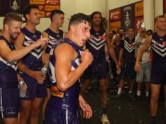 Fremantle Dockers club song: The big change to the way Freo players sing after a win