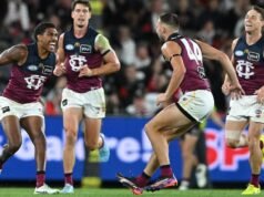 Wounded Lions surge late to beat Saints, get off mark