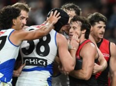 AFL star sent to tribunal for wiping blood on opponent