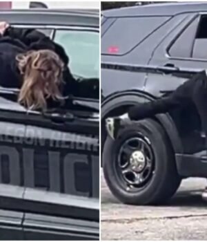 us-woman-squeezes-out-of-police-car-window-while-handcuffed-013627120-16x9_0.jpg